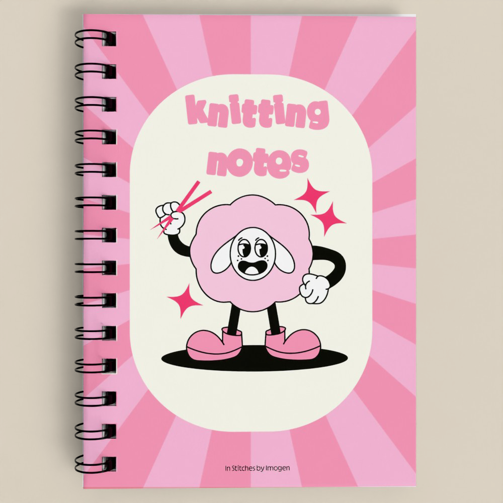 Notebook with a pink character design and 'knitting notes' text on a beige background