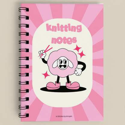 Notebook with a pink character design and 'knitting notes' text on a beige background